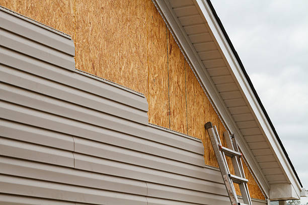 Professional Emergency Siding Repair technician working in Stevensville, MD
